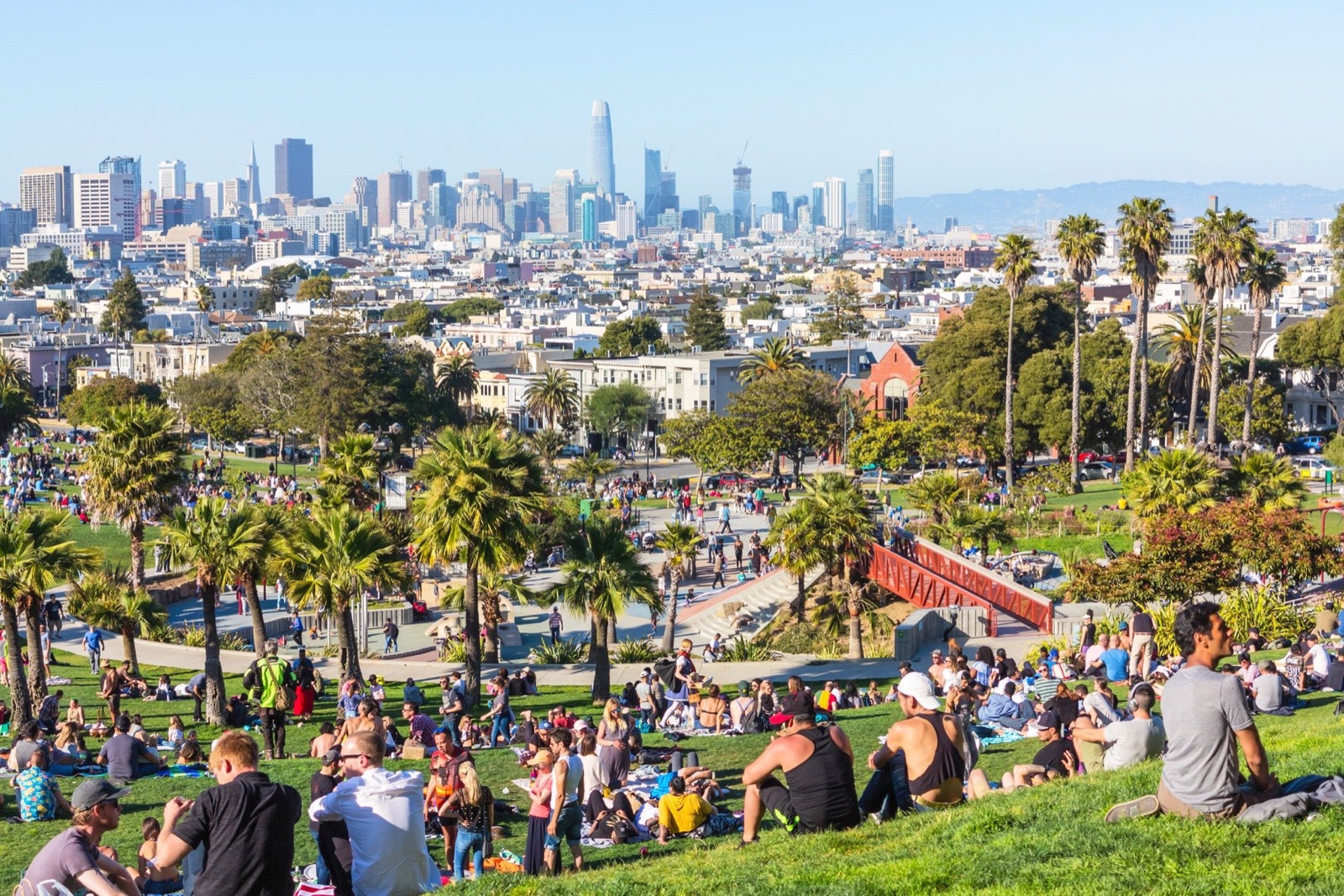 People relaxing on the grass at Dolores Park