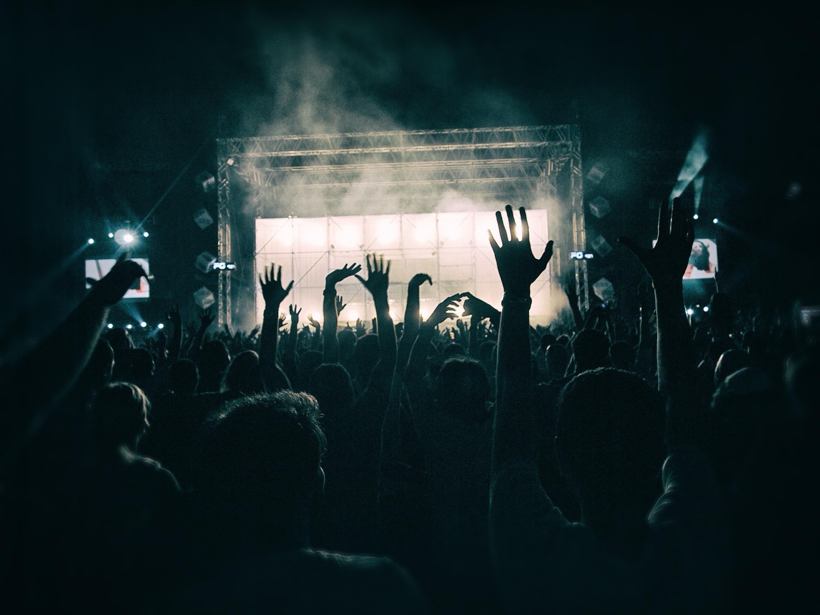 Friends meeting at a concert venue