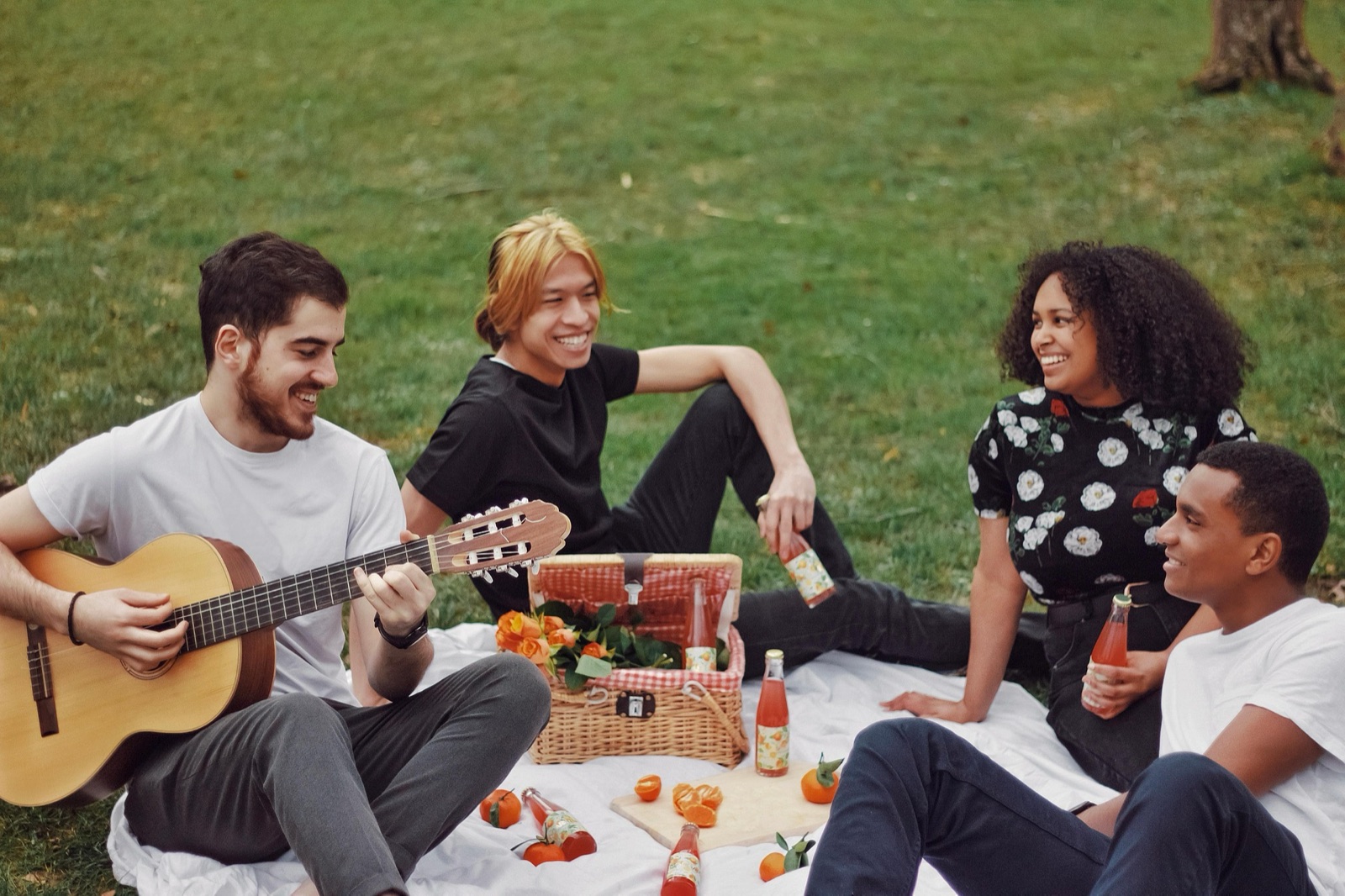 Friends sharing a picnic in a city park